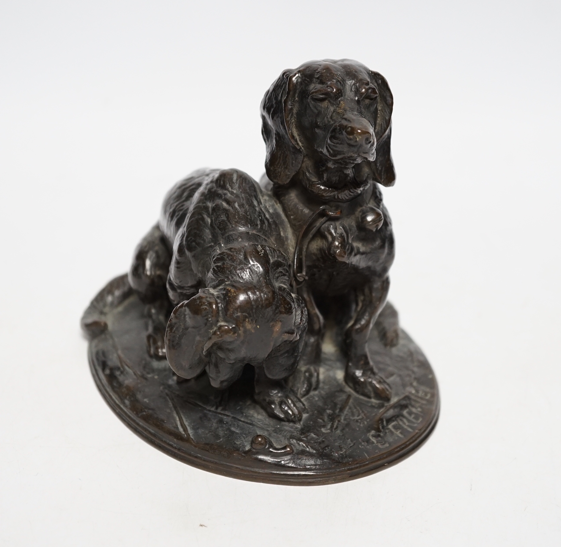 After Emmanuel Fremiet (1824-1910), a bronze group of spaniels, 14cm